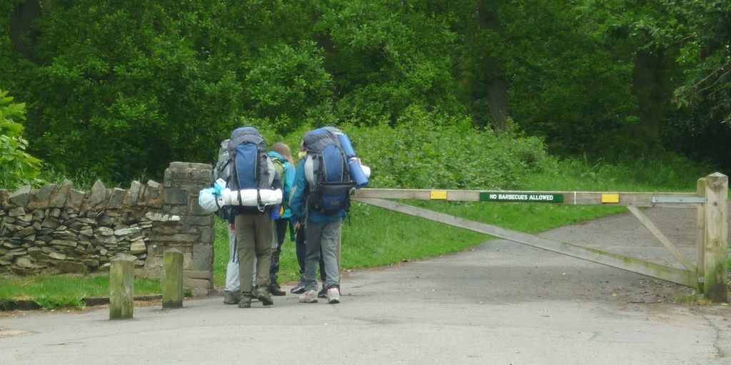 parents guiding child in a park