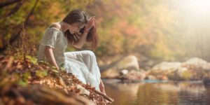 professional woman relaxing in a home office with nature view