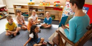 children engaged in educational activities in a classroom setting