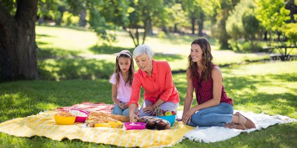 happy family playing in a park