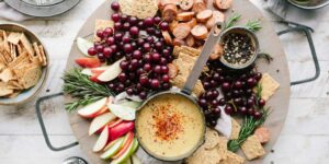 flat lay photography of sliced apples, sausages, chips and brown sauce